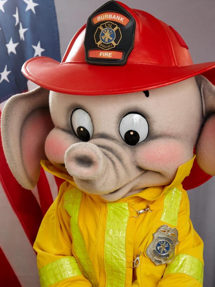 Lil' Squirt, an elephant in firefighter gear